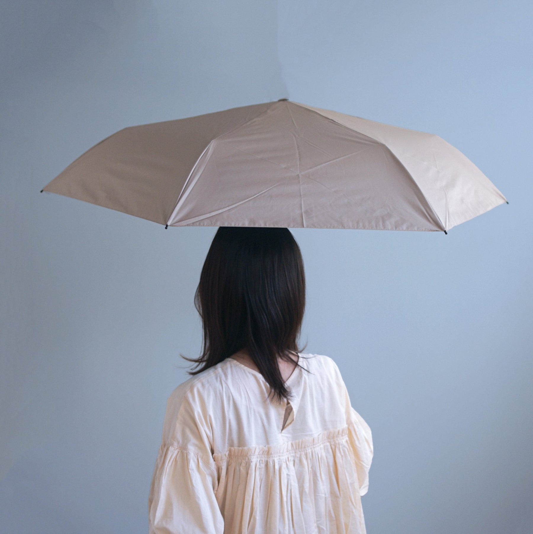 Automatic opening and closing umbrella for both sunny and rainy days 55cm